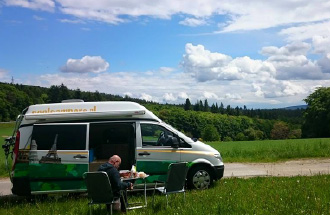 Camper in field